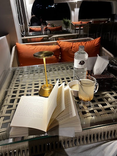H2O Cafe table with book and tea